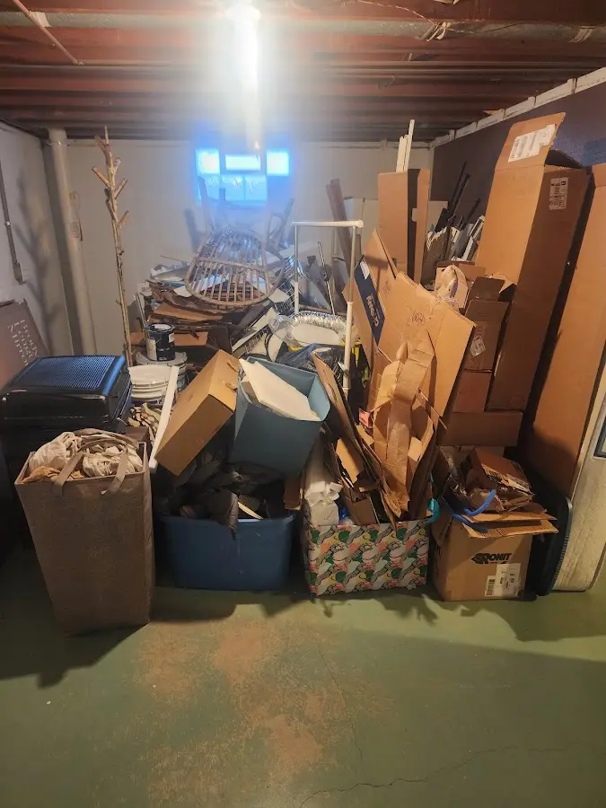 Roll-off dumpster container at job site for Concrete Dumpster Rental in Raritan